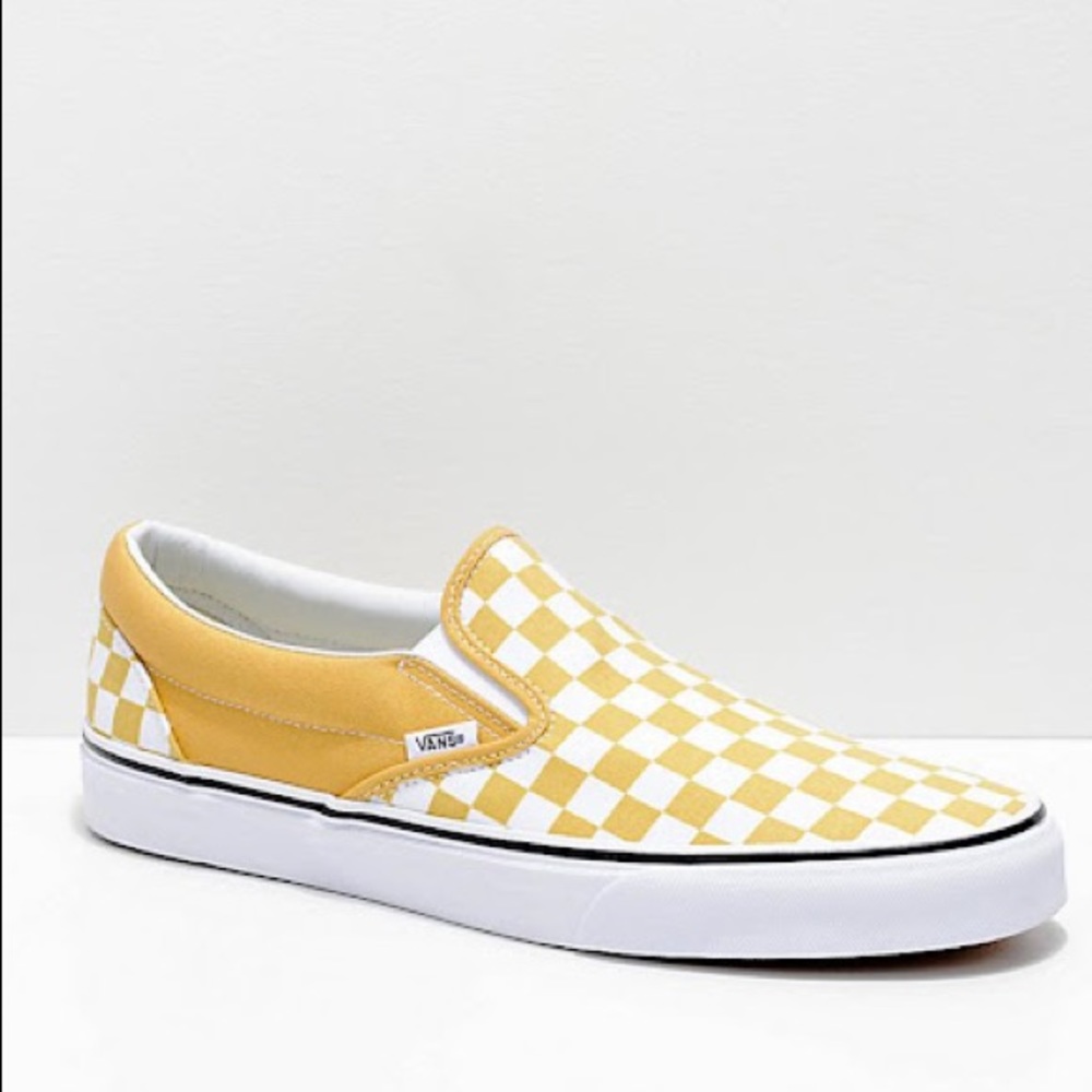 Vans yellow checkered slip on